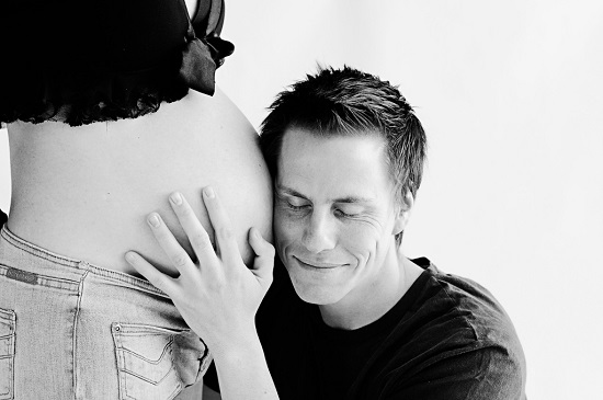 Pregnant woman with a happy man