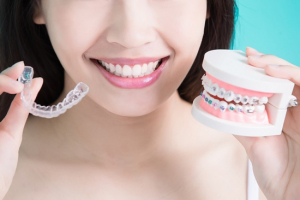 Young woman with invisalign